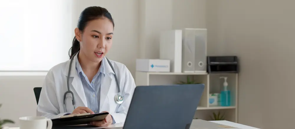 dentist talking to her patient